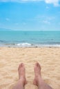 Relaxing feet on the beach Royalty Free Stock Photo